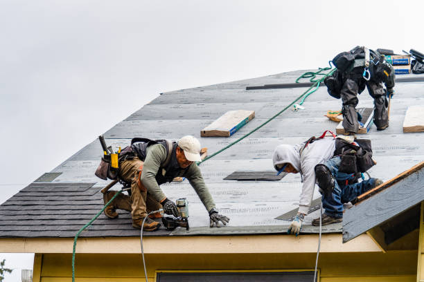Professional Roofing technician working in Center Point, TX